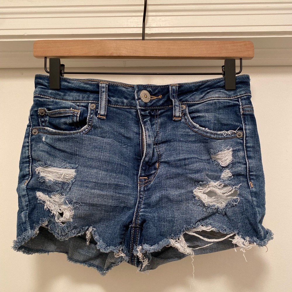 American Eagle High Rise Shortie women’s size 4 distressed blue jean shorts